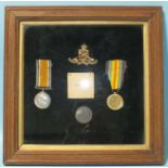 A WWI pair awarded to 145313 Gnr H Mills RA: British War and Victory medals framed with a Royal