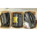 A large quantity of Scalextric track, handsets, etc.