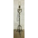 A brass extending oil lamp stand and clear glass oil lamp, 150cm high, 210cm extended, reputed to