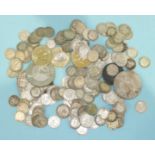 A collection of various British and world coinage, including approximately 170 pre-1947 silver 3d,