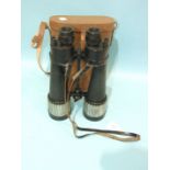 A pair of Barr and Stroud military binoculars AP no. 1907A and stamped 7XCF42, the right lens with