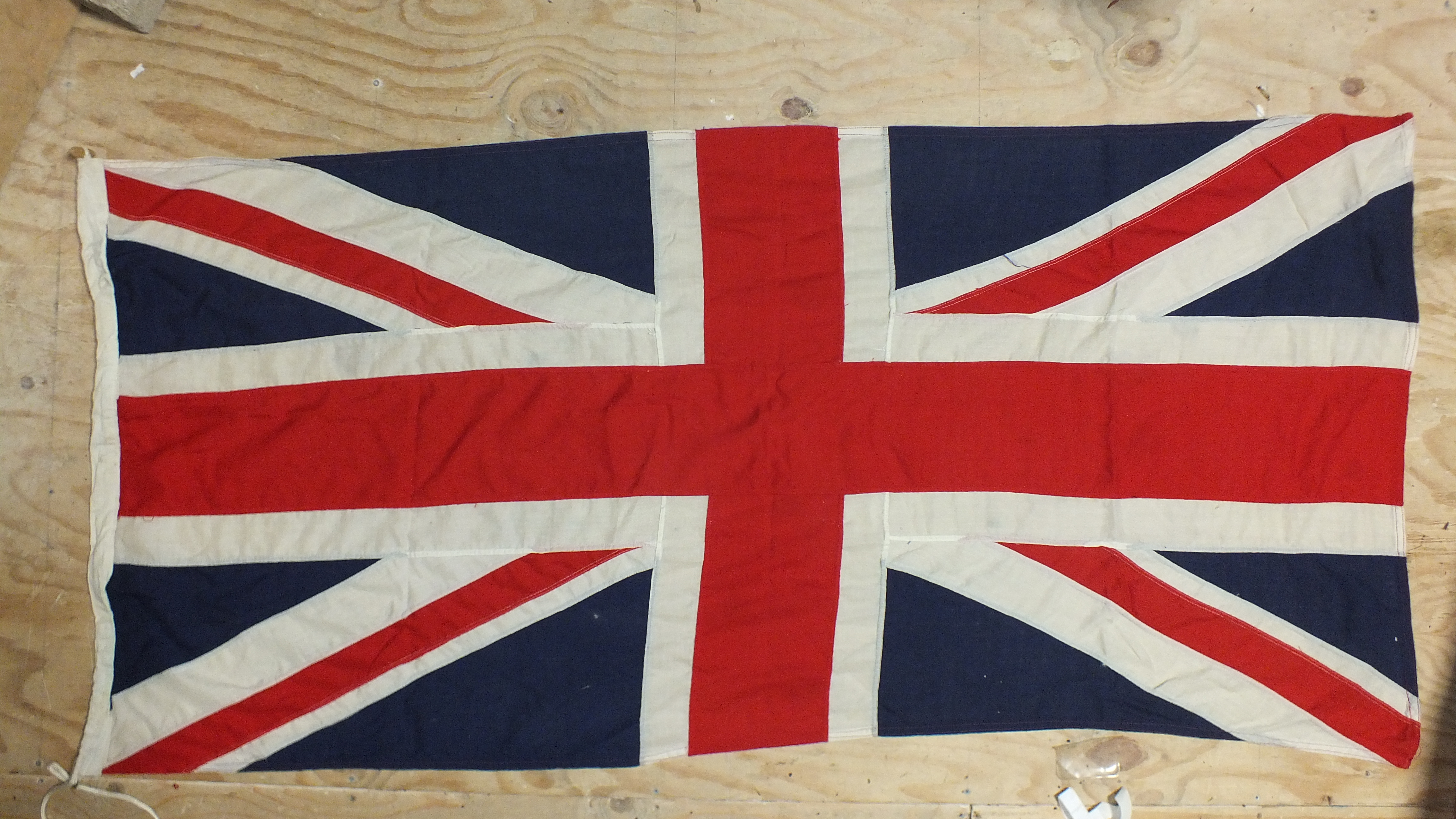 A Union flag, stitched, 83 x 184cm.