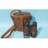 A pair of leather-cased WWI pattern service binoculars, the case marked J Brooks & Co. Ltd, 1916,