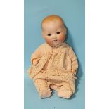 An Armand Marseille 351/5K bisque head baby doll with jointed character body, 38cm.