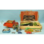 A Schuco 1001 red saloon, a Dinky 34c loudspeaker van, a Triang c/w Loch Ness Monster, boxed, (n/w),