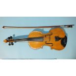 A violin, the two-piece back 35cm long, 58cm (23'') overall, label for Thomas Restell, Wokingham,