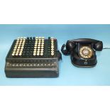 A "Bell Telephone MFG Co." Bakelite telephone with RTT label and a "Sum Lock" adding machine, (2).