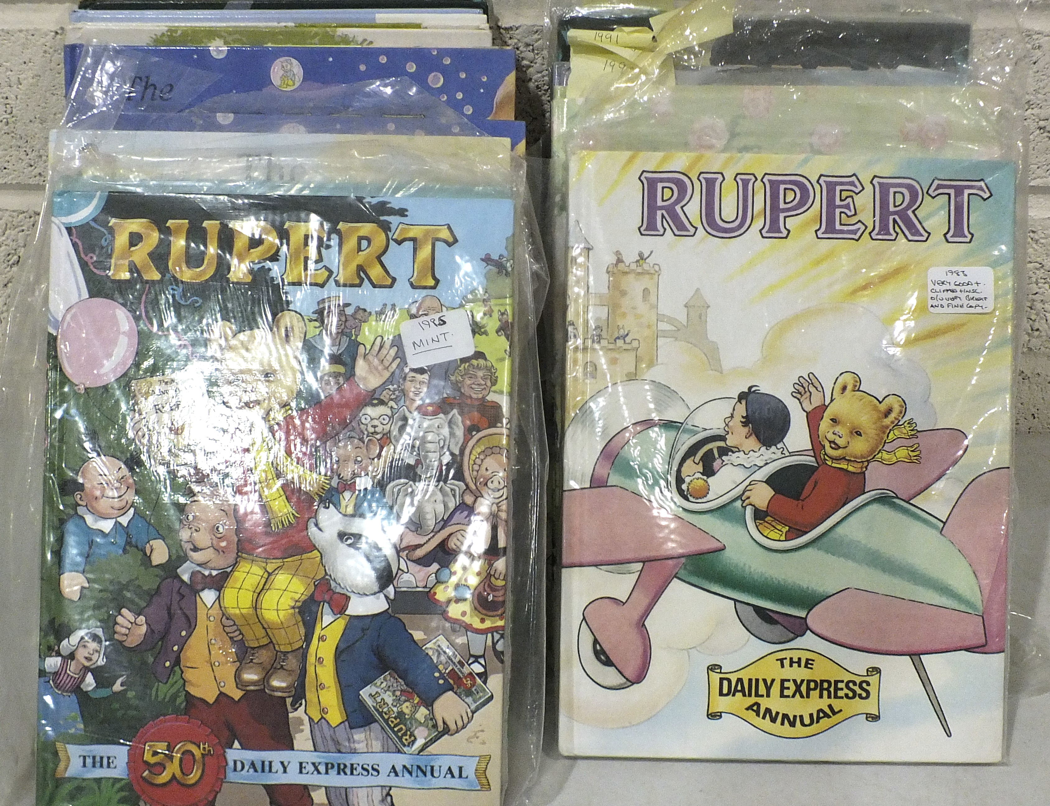 Eighteen Rupert Bear annuals, 1980's-1990's.