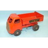 A Triang pressed steel tipper lorry, 300 Series, all red, with Triang Transport decal, 38cm long.