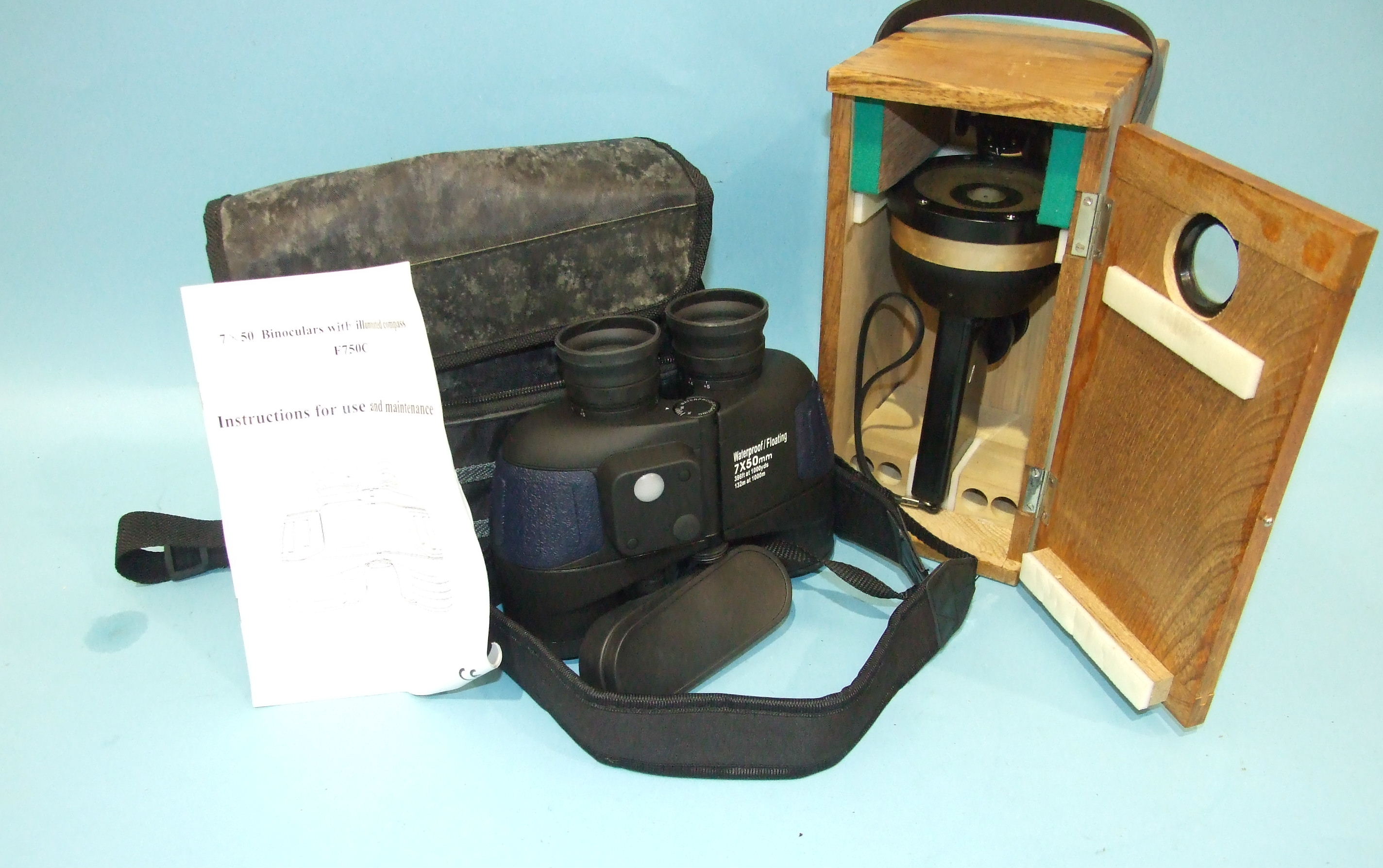 A pair of Bak 4 waterproof/floating 7x50 binoculars with illuminated compass, in case with