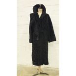 A Persian lamb coat with wide collar and cuffs and a Persian lamb collar, (2).