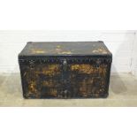 A 'leather'-covered studded and bound packing trunk, the lined interior labelled Asnièrs, Louis