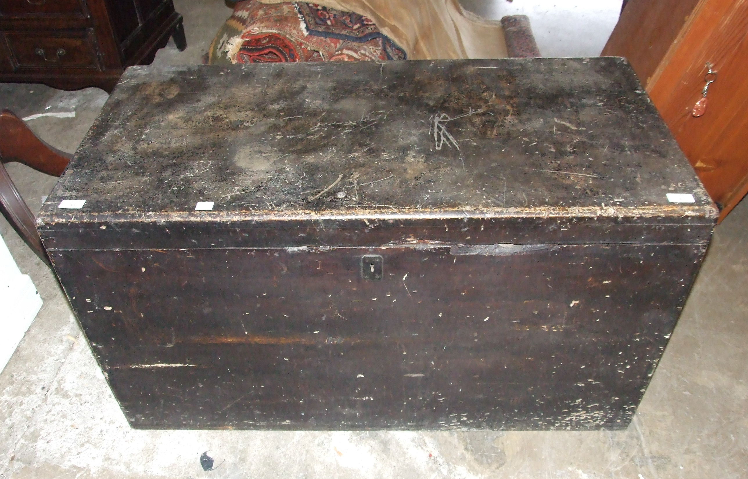 A stained wood tool chest, 109cm wide.