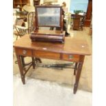 A 19th century mahogany wash stand in the Gillows style, the rectangular top above two small
