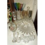 A collection of glassware, including two ships decanters, a set of six long-stemmed Champagne flutes