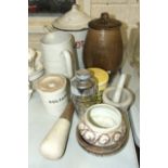 An enamel flour bin and cover, 33cm high, an Arcoroc glass cocktail shaker, a Portmeirion yellow