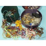 A quantity of costume jewellery in two cases.