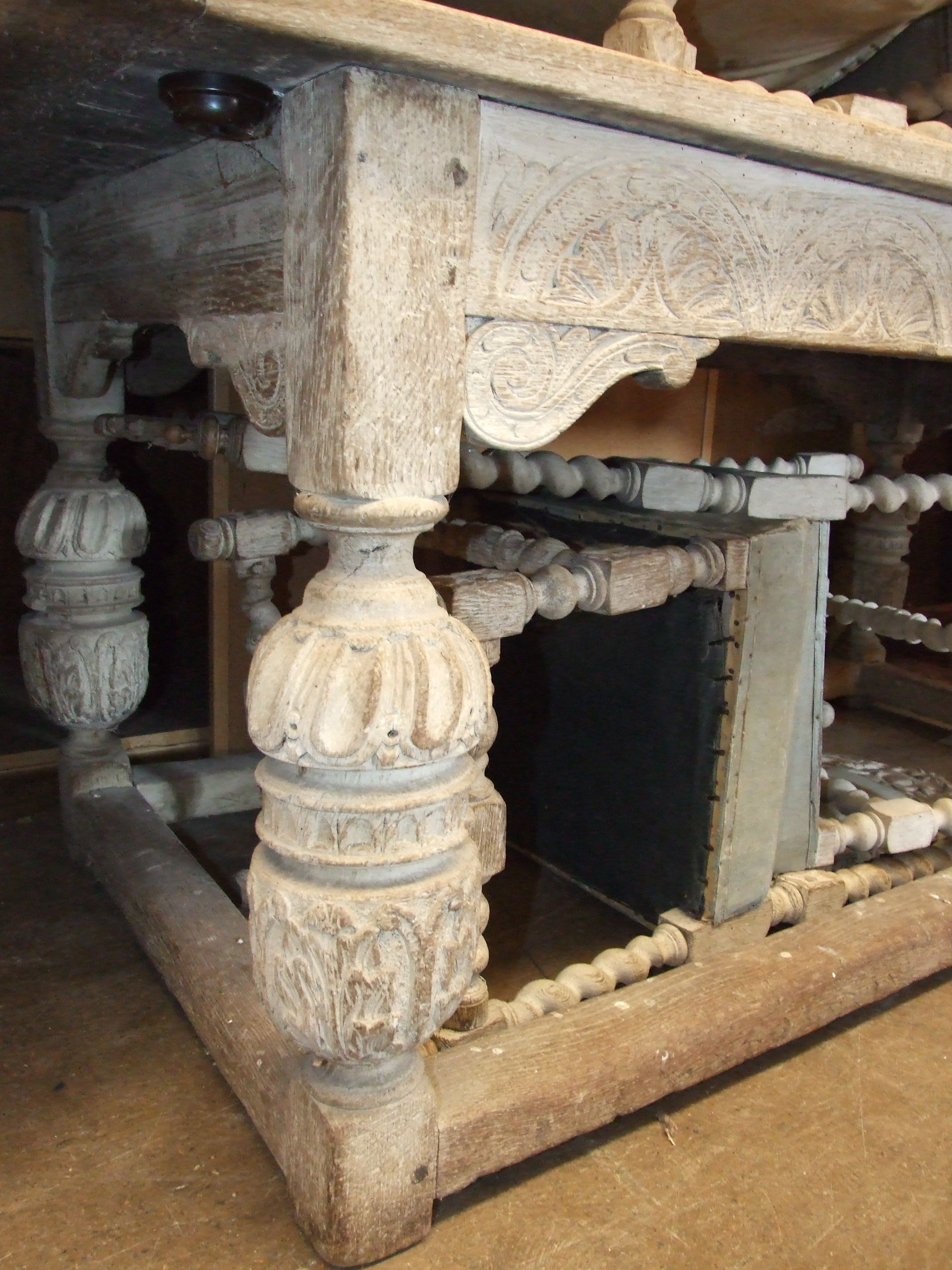 An Elizabethan-style limed oak refectory dining table, the rectangular top above a carved frieze and - Image 2 of 2