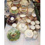 A collection of decorative 19th and early-20th century cups and saucers, a Hughes and Co. pale