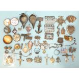 A quantity of silver and white metal brooches, buckles, medallions, charms, etc, including a