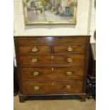 A Georgian mahogany rectangular chest of two short and three long cockbeaded drawers, on bracket