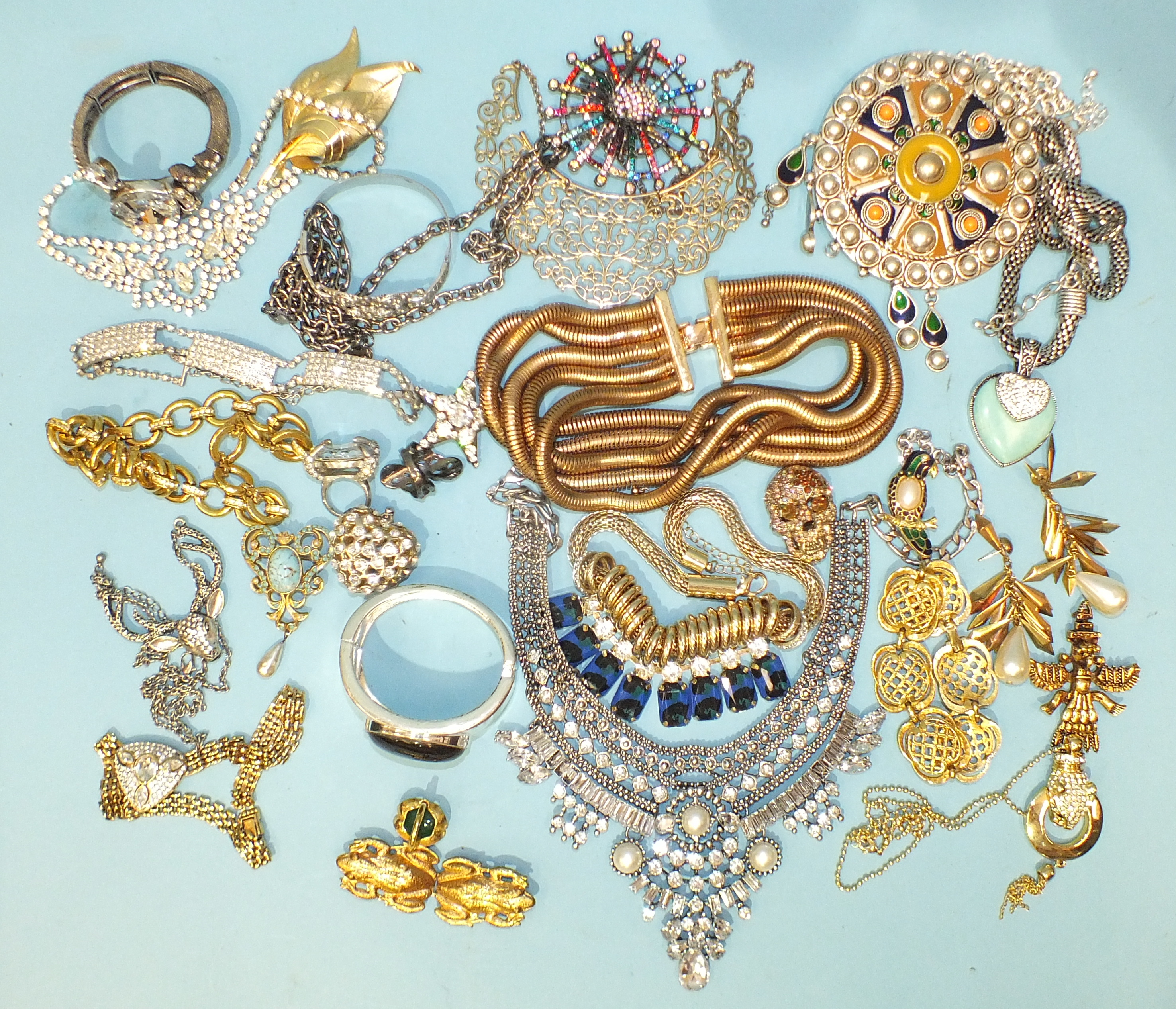 A quantity of outsized costume jewellery.