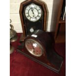 An early-20th century inlaid mahogany mantel clock with gong-striking movement and a walnut-cased