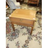 A G-Plan rectangular hardwood single-drawer table, on brass-capped square legs, 54cm wide, 53cm