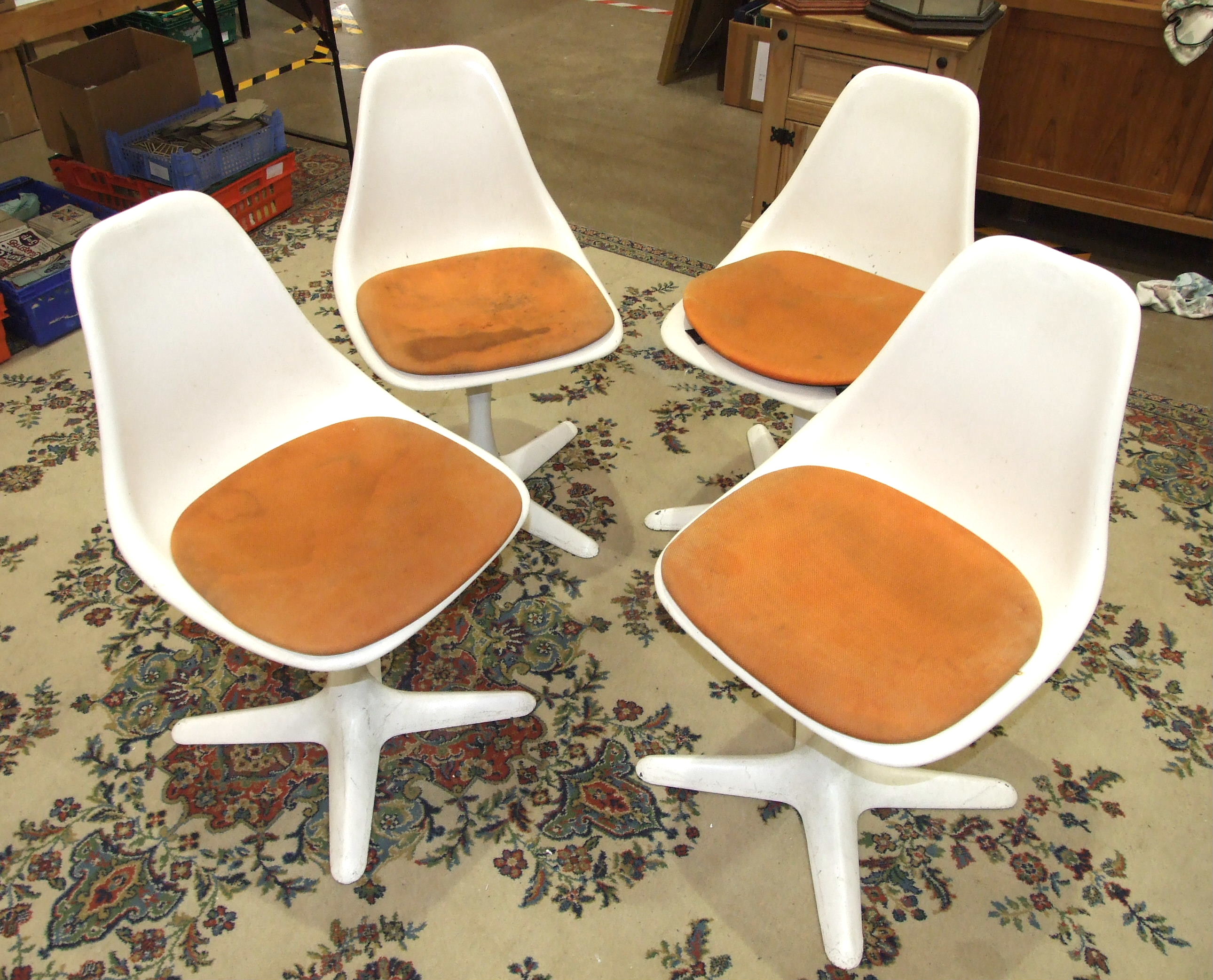 A set of four 1960's Arkana 103 aluminium and fibreglass tub dining chairs, each sprung swivel