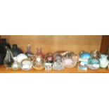 A collection of various modern glass paperweights, scent bottles, etc.