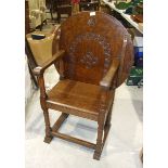 An oak monk's seat/circular occasional table, 68cm diameter.