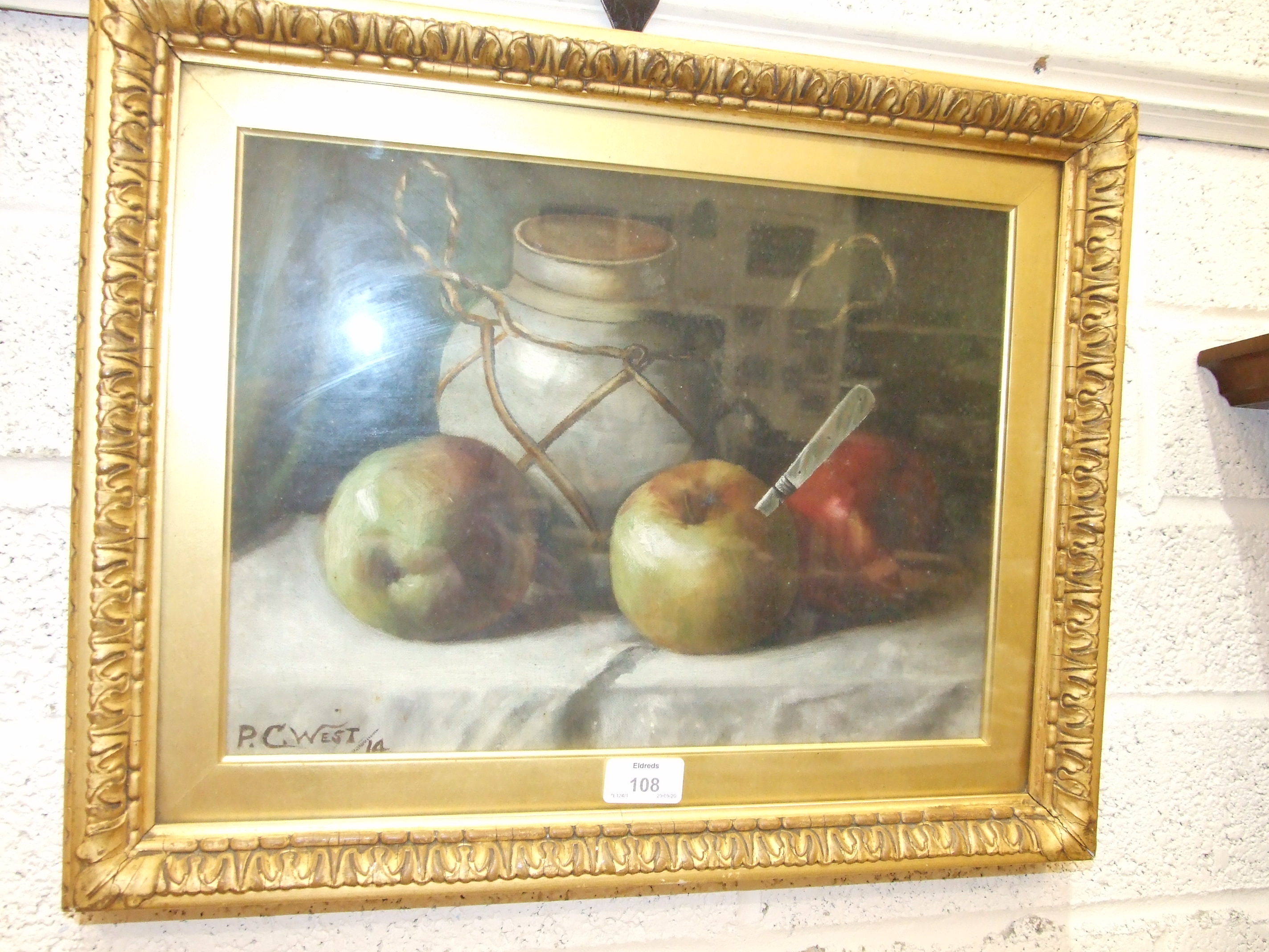 P C West, 'Still Life, apples and storage jar', a signed oil on canvas, dated '14, 26 x 36cm and J