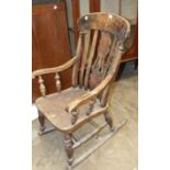 An elm and beech farmhouse-style rocking chair, (woodworm) and a wooden chest, 76cm wide, (2).