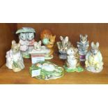 A collection of nine Beswick Beatrix Potter figures, including 'Appley Dapply', 'Timmie Willie', '