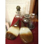 A pair of brown and cream studio glass vases of flat ovoid form with long necks, 40cm high, a