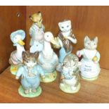 A collection of seven Beswick Beatrix Potter figures, including 'Susan', 'Tabitha Twitchett', 'Tom