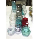 A small collection of Dartington glass vases and other glassware.