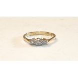 An 18ct gold ring illusion-set three 8/8-cut diamonds, size L, 2g, boxed.