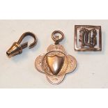 A 9ct rose gold medallion and other items, 5.7g.