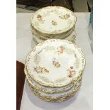 Fifteen pieces of a Continental dessert service with gilt and floral decoration.