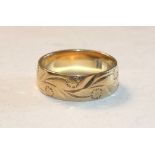 An 18ct gold wedding band, size N, 6.3g.