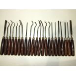 A collection of Marples mortice chisels, gouges and carving tools with hardwood handles, (22).