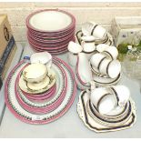 A collection of Worcester transfer-printed pink and gilt dinner ware, approximately twenty pieces,