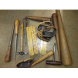 A collection of sail makers, wood fids, palms and other tools, in two tool boxes.