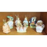 A collection of seven Beswick Beatrix Potter figures, including 'Benjamin Bunny (third version)', '