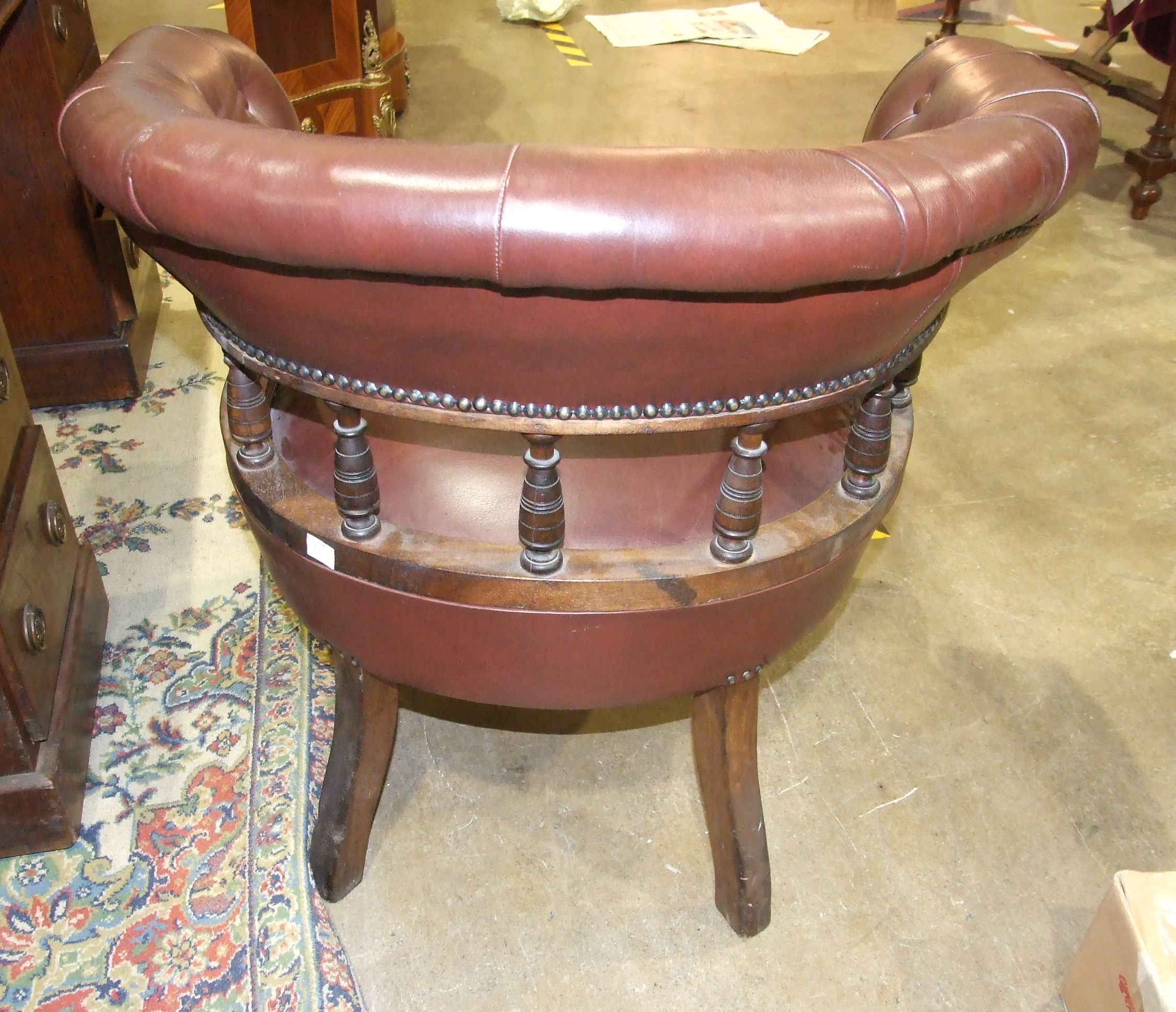An Edwardian walnut button-back tub armchair, with upholstered rail, on turned spindles, the - Image 2 of 3