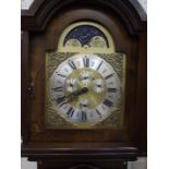 A modern mahogany-cased grandfather clock, having arched moon phase dial with day, month, date and