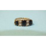 A 9ct gold ring set three oval sapphires and two pairs of brilliant-cut diamonds, size M, 4g.