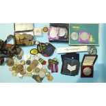 A quantity of coins, badges, etc.