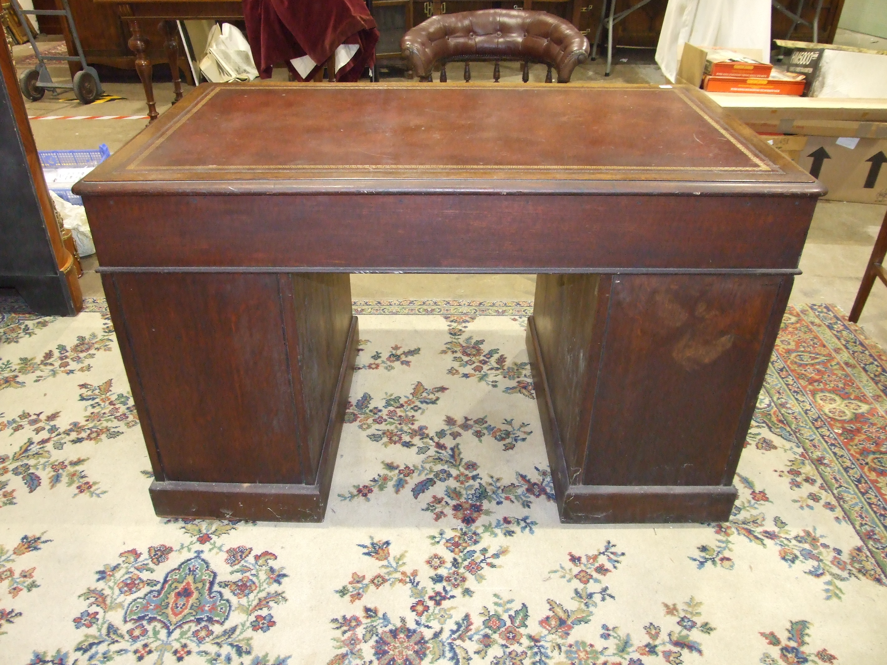 An Edwardian oak knee-hole desk, the top inset with writing surface above three frieze and six - Image 3 of 3